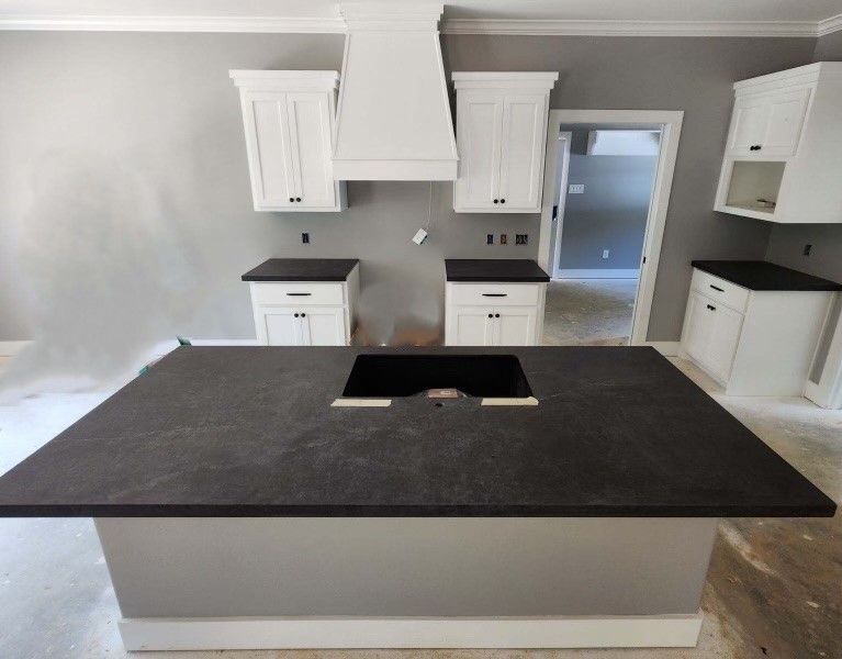 From Layout to Finish: Black Mist Honed Granite & Dekton Laos