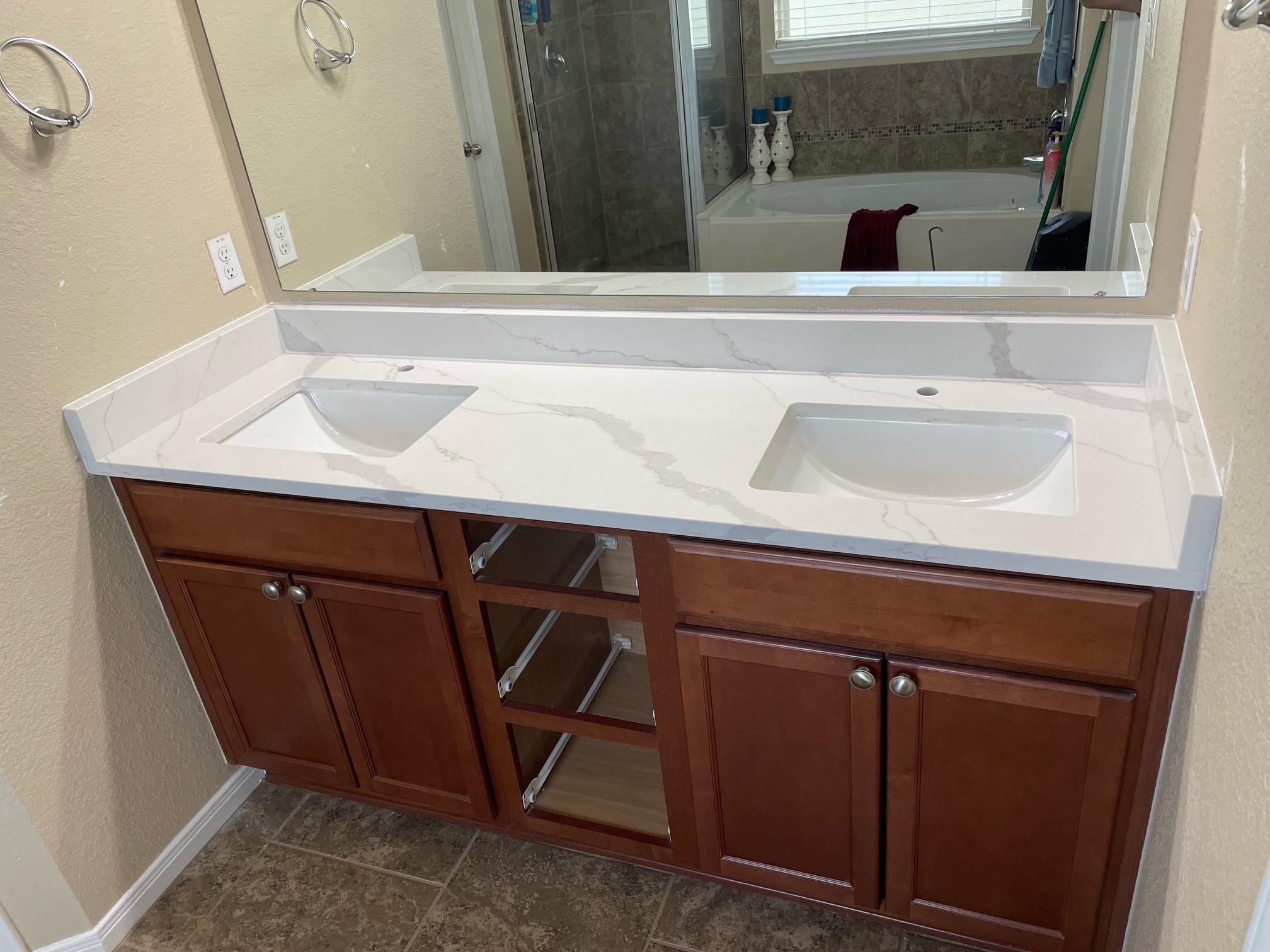 double sink bathroom vanity with white quartz countertops