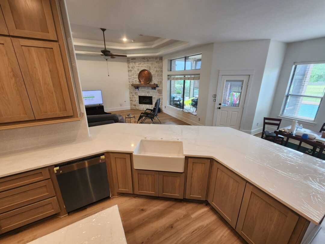 modern home interior with white quartz peninsula kitchen countertop