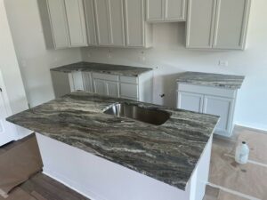 bold colorful quartz countertops with kitchen island