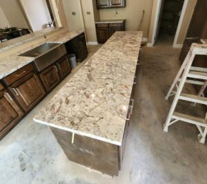 warm and traditional kitchen island with quartz countertop
