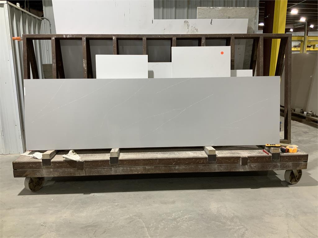 Quartz Countertop Finishes to Choose From for Your Remodel A slab of quartz countertop at a slab yard.