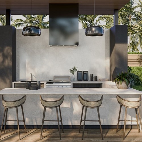 A luxury outdoor kitchen with a porcelain island in the Teracanto Dune Classica by LX Hausys