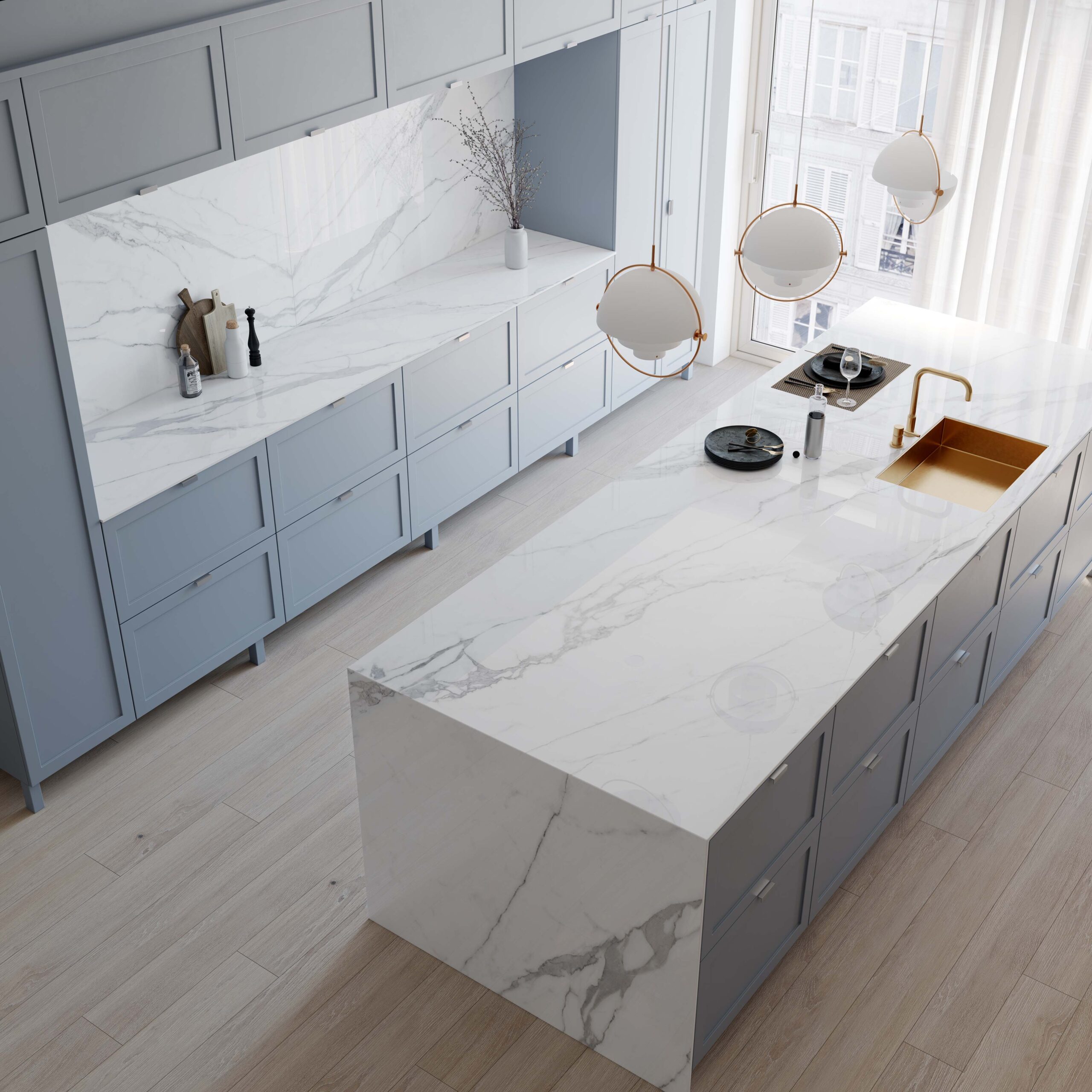 Modern white kitchen with Teracanto porcelain countertops in the shade Statuario Bianco and custom waterfall island. 