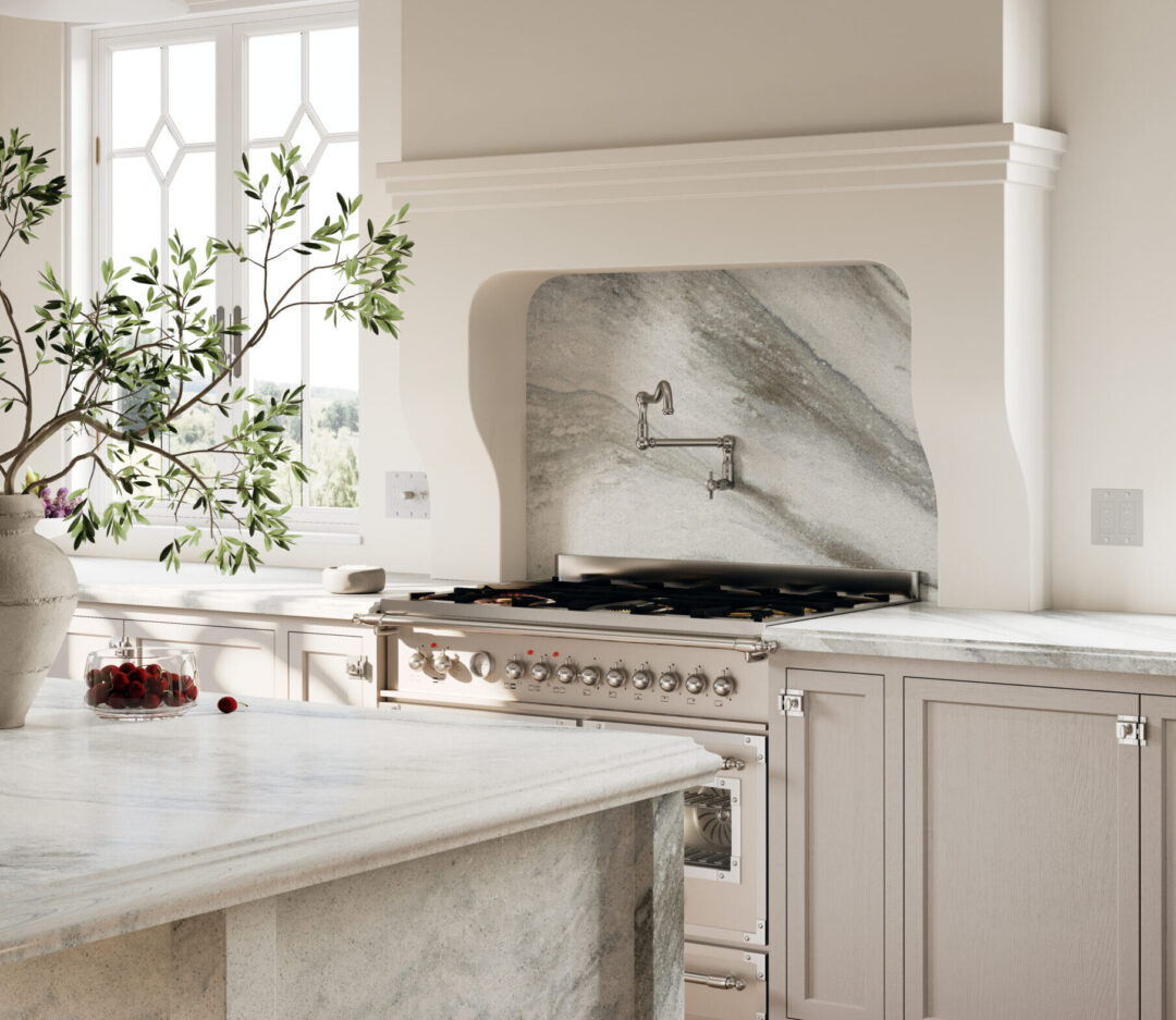 A luxury grey and white kitchen with a full height quartz backsplash behind the oven.